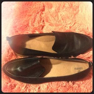 Black leather flats